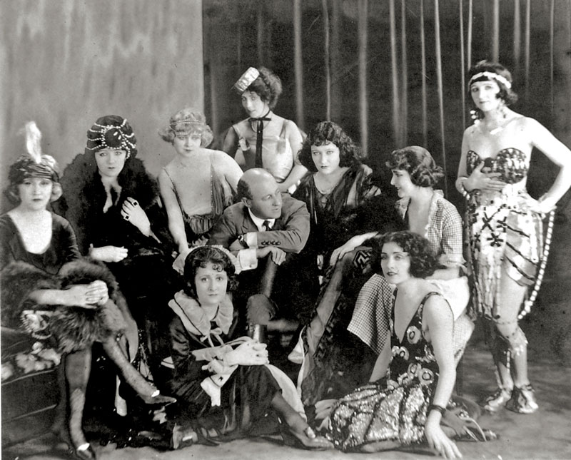 DeMille on the set of The Affairs of Anatol (1921) with, among others, the future stars Bebe Daniels and Gloria Swanson